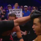 A WWE fan holds up a sign about Dreamcast game Skies of Arcadia